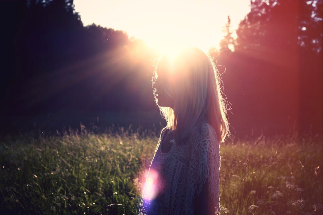 Woman outdoors in morning sunlight